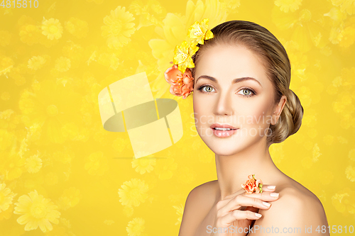 Image of beautiful girl with flowers on head