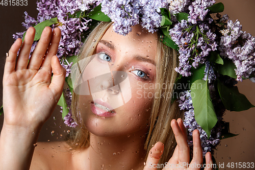 Image of beautiful girl with flower wreath on head