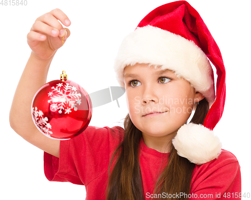 Image of Young happy woman in christmas cloth