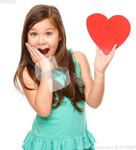 Image of Portrait of a little girl in red