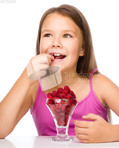 Image of Little girl with raspberries