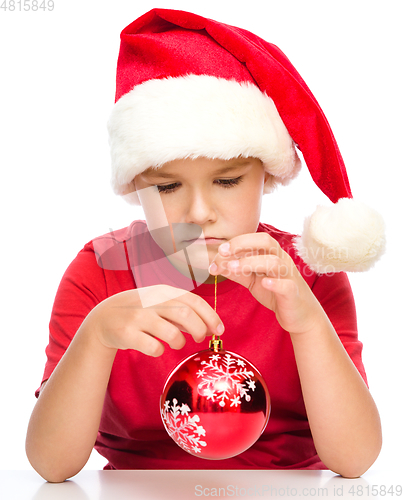 Image of Young unhappy girl in christmas cloth