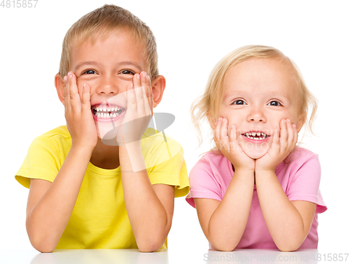 Image of Portrait of a cute little girl and boy