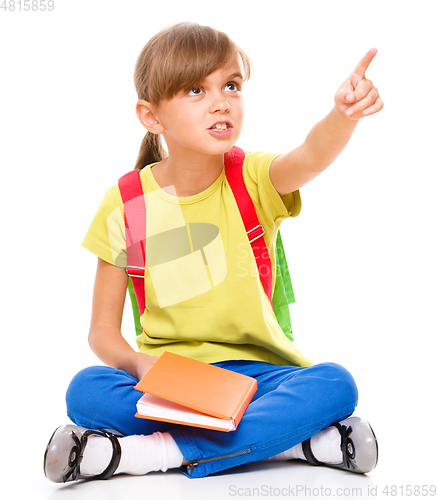 Image of Little girl with her books