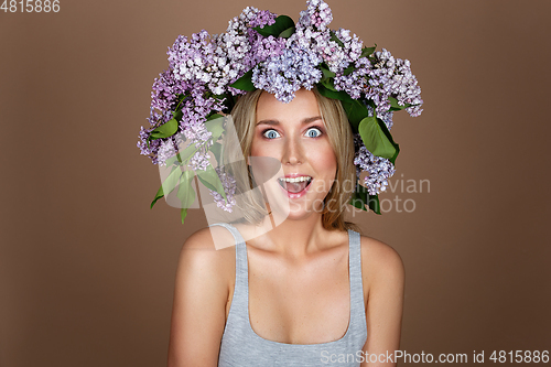 Image of beautiful girl with flower wreath on head