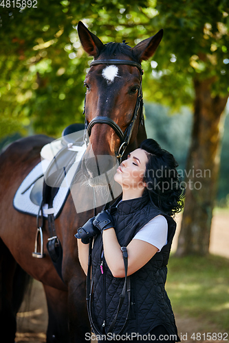 Image of beautiful girl with horse