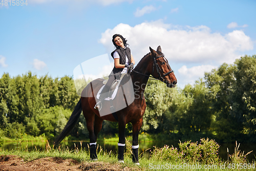 Image of beautiful girl with horse