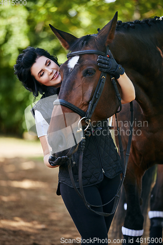 Image of beautiful girl with horse