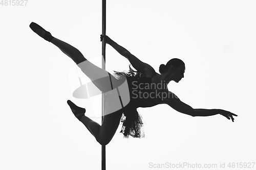 Image of beautiful pole dancer girl silhouette