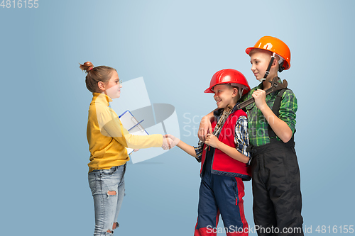 Image of Kids dreaming about future profession of engineer