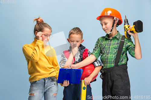 Image of Kids dreaming about future profession of engineer