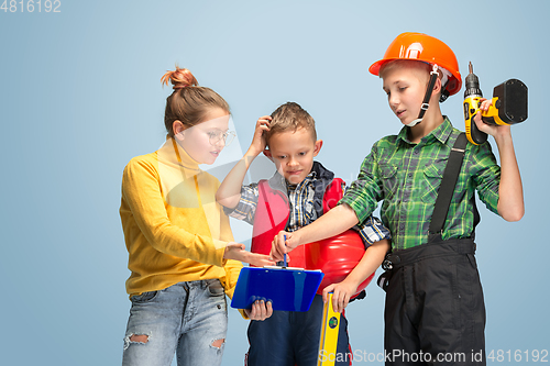 Image of Kids dreaming about future profession of engineer