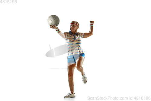 Image of Senior woman playing volleyball in sportwear on white background