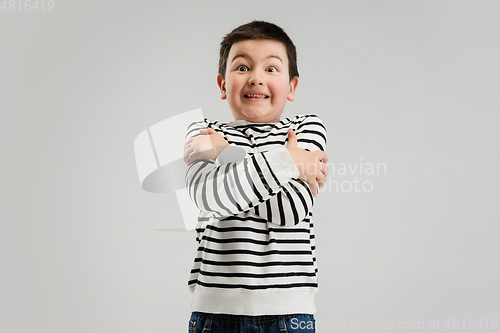 Image of Caucasian boy isolated on white studio background. Copyspace. Childhood, education, emotions concept