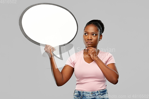 Image of african american woman holding speech bubble