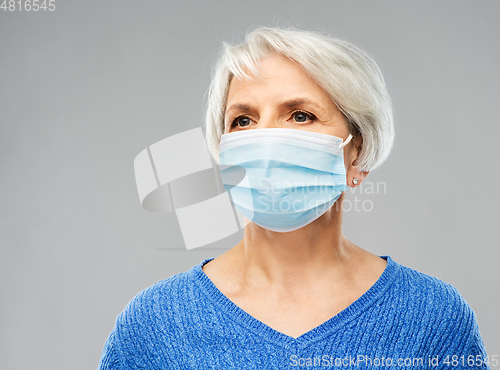 Image of senior woman in protective medical mask