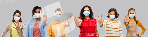 Image of women in medical masks for protection from virus