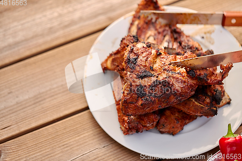 Image of grilled barbecue meat stack on plate