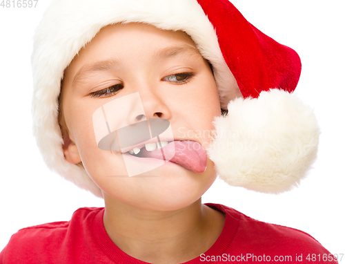 Image of Little girl in santa hat