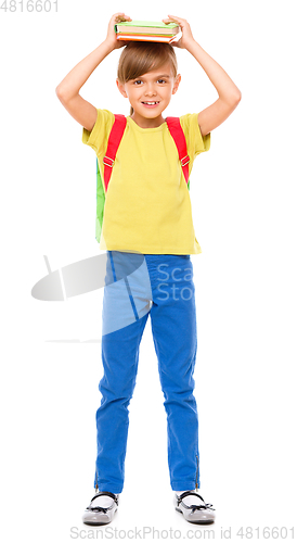 Image of Portrait of a cute little schoolgirl with backpack