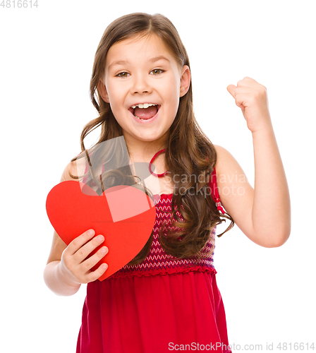 Image of Portrait of a little girl in red