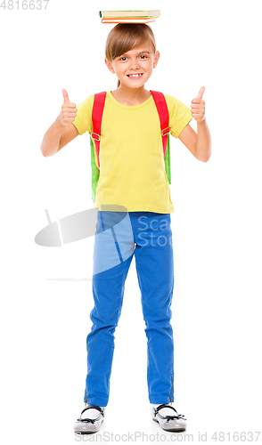 Image of Portrait of a cute little schoolgirl with backpack