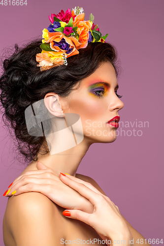 Image of beautiful girl with flower accessories