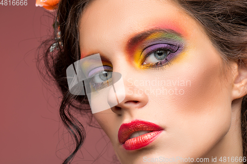 Image of beautiful girl with flower accessories