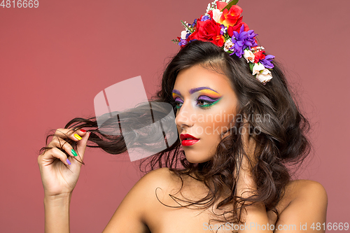 Image of beautiful girl with flower accessories