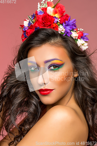 Image of beautiful girl with flower accessories