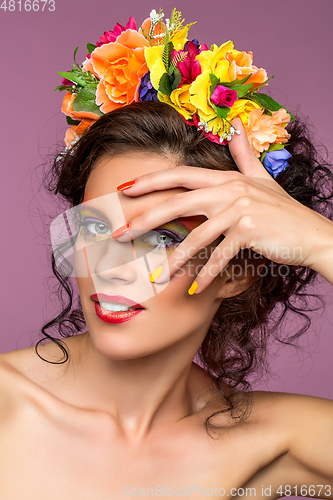 Image of beautiful girl with flower accessories