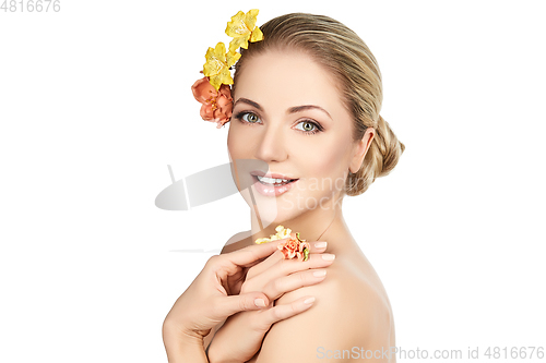 Image of beautiful girl with flowers on head