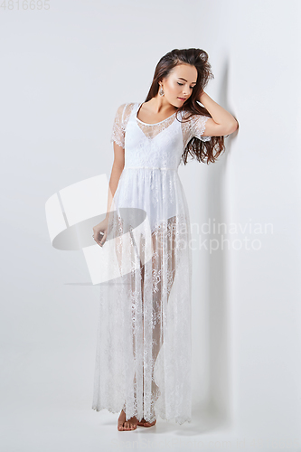 Image of beautiful girl in white lace dress