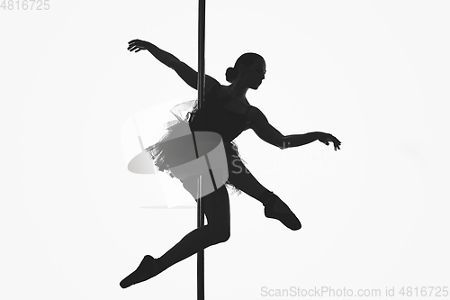 Image of beautiful pole dancer girl silhouette