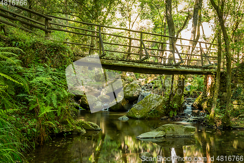 Image of Wooden bridge near waterfall in Cabreia Portugal