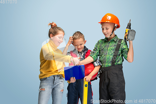 Image of Kids dreaming about future profession of engineer