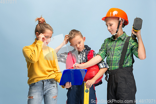 Image of Kids dreaming about future profession of engineer