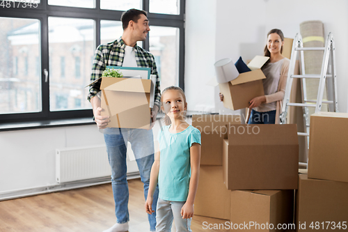 Image of happy family with child moving to new home