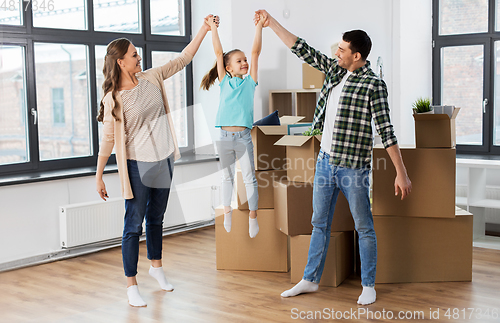 Image of happy family with child moving to new home