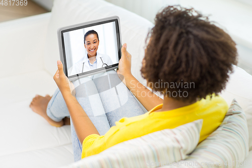 Image of patient having video chat with doctor on tablet pc