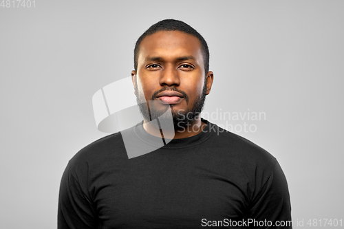 Image of portrait of african american man in black t-shirt