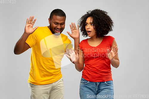 Image of happy smiling african american couple dancing