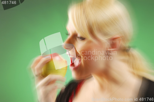 Image of Pregnant woman with apple