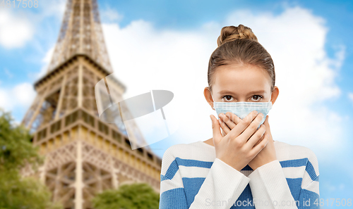 Image of teenage girl in protective medical mask in france