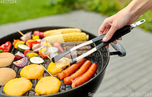 Image of barbecue kebab meat and vegetables on grill