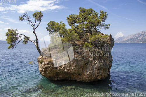 Image of Small stone islet on Punta Rata beach in Brela