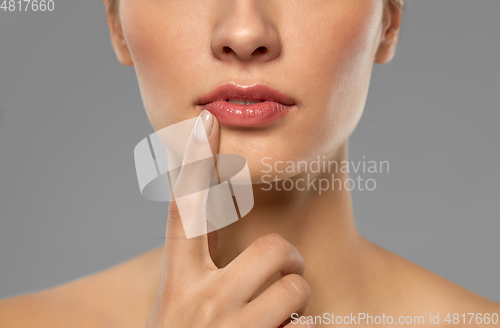 Image of close up of beautiful young woman face and lips