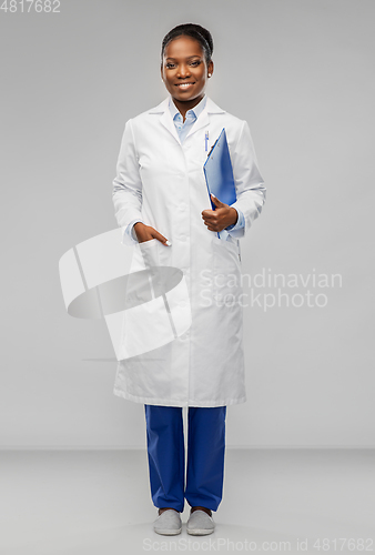 Image of happy african american female doctor or scientist