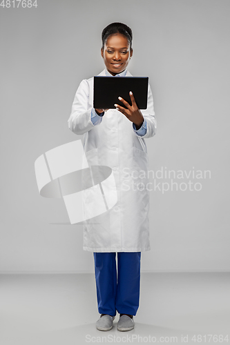 Image of african american female doctor with tablet pc