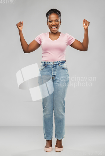 Image of happy african american woman celebrating success